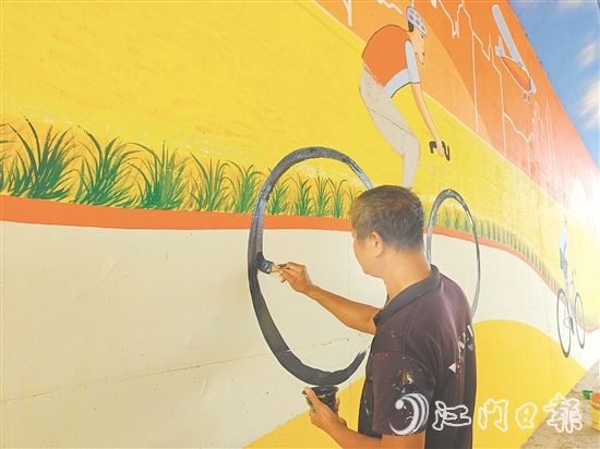 水泥墙面被色彩丰富的巨型壁画所取代,成为一道亮眼的风景线。 水泥墙面被色彩丰富的巨型壁画所取代,成为一道亮眼的风景线。