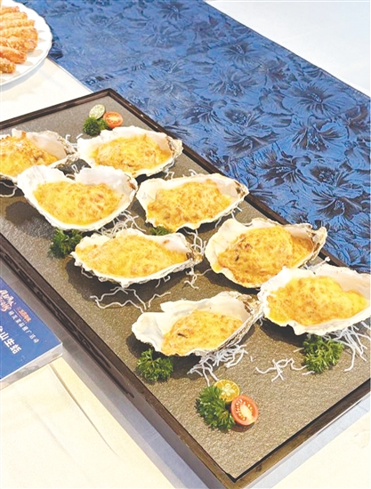 海胆酱烤台山生蚝色泽诱人。 海胆酱烤台山生蚝色泽诱人。