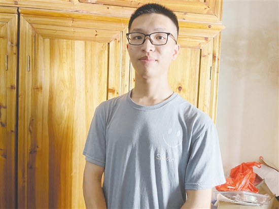 梁志浩。